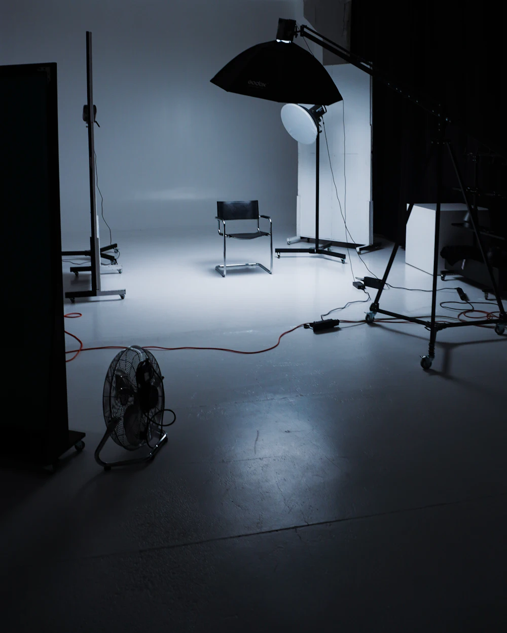 Empty photo studio with lighting set up