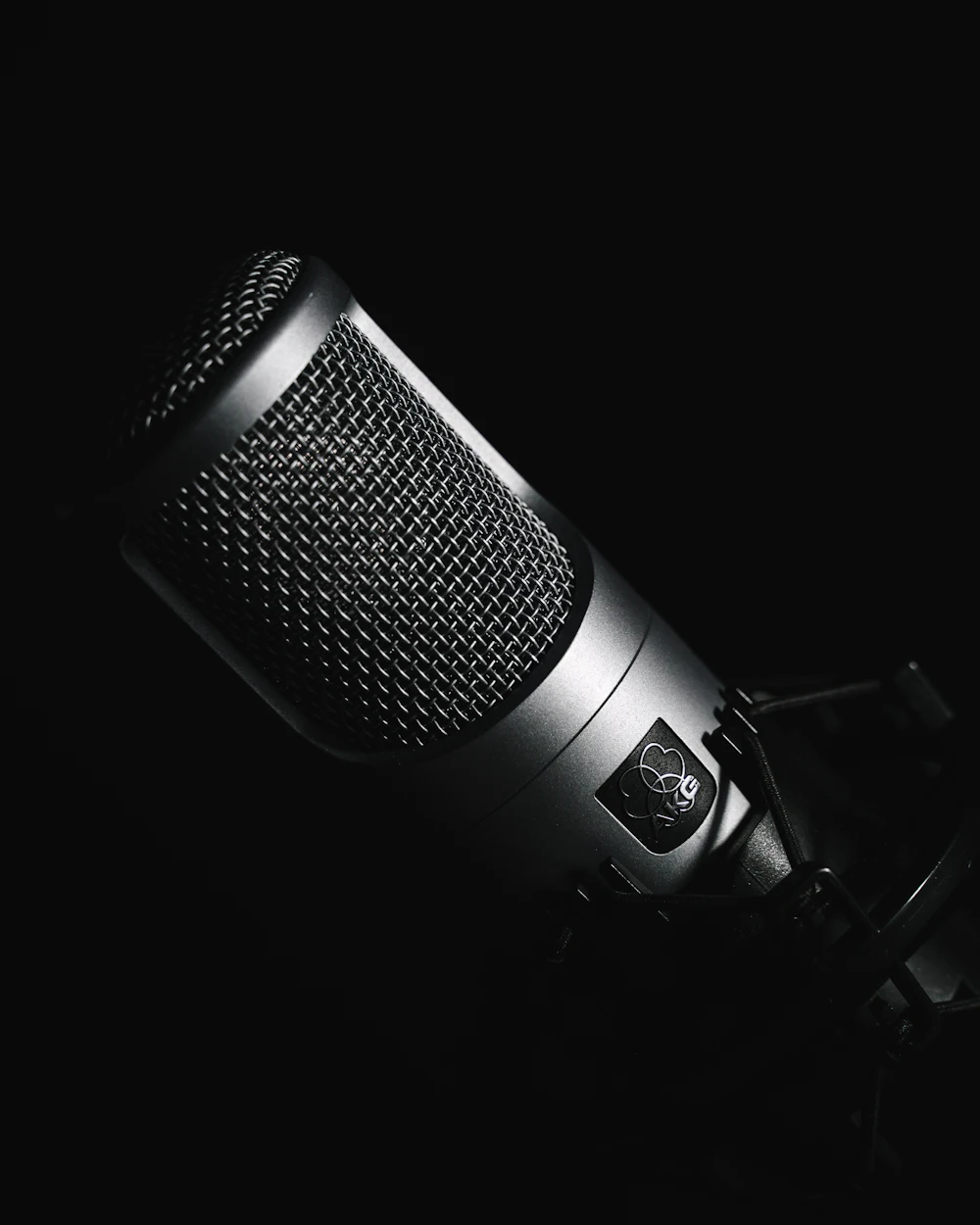 Podcast microphone in a dark studio