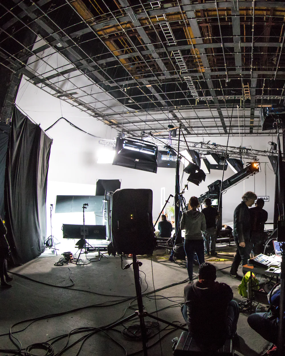 Film soundstage with lights and a camera rig